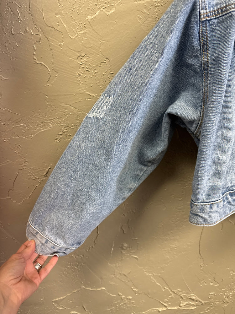 OVERSIZED DISTRESSED DENIM JACKET