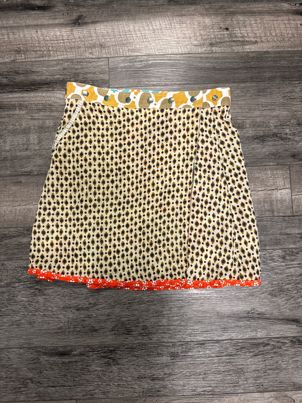 ARENA REVERSIBLE WRAP SKIRT