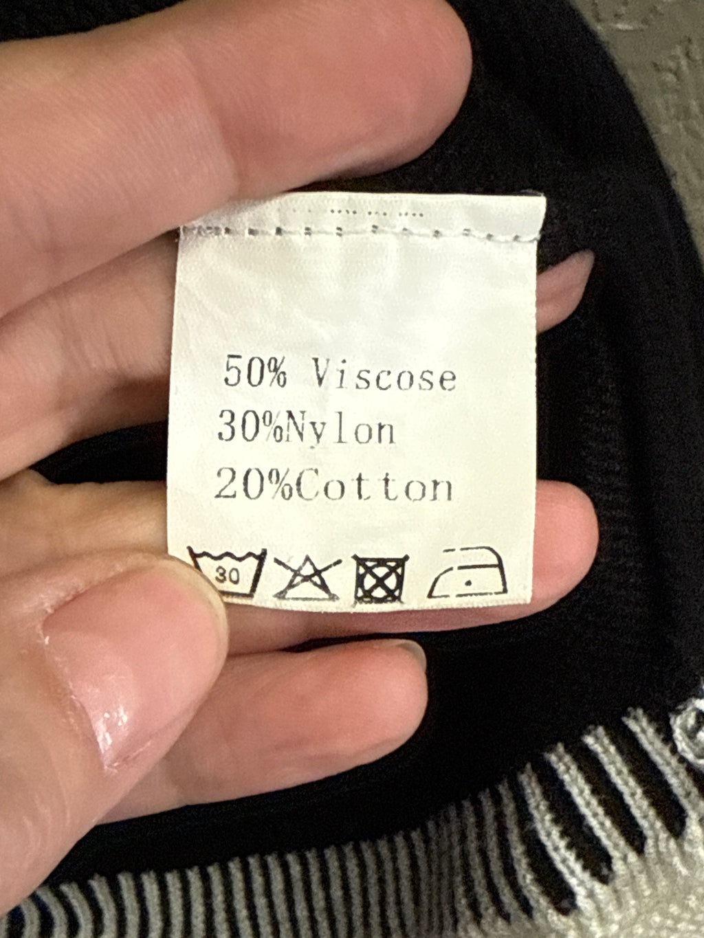 SLEEVELESS KNIT TOP