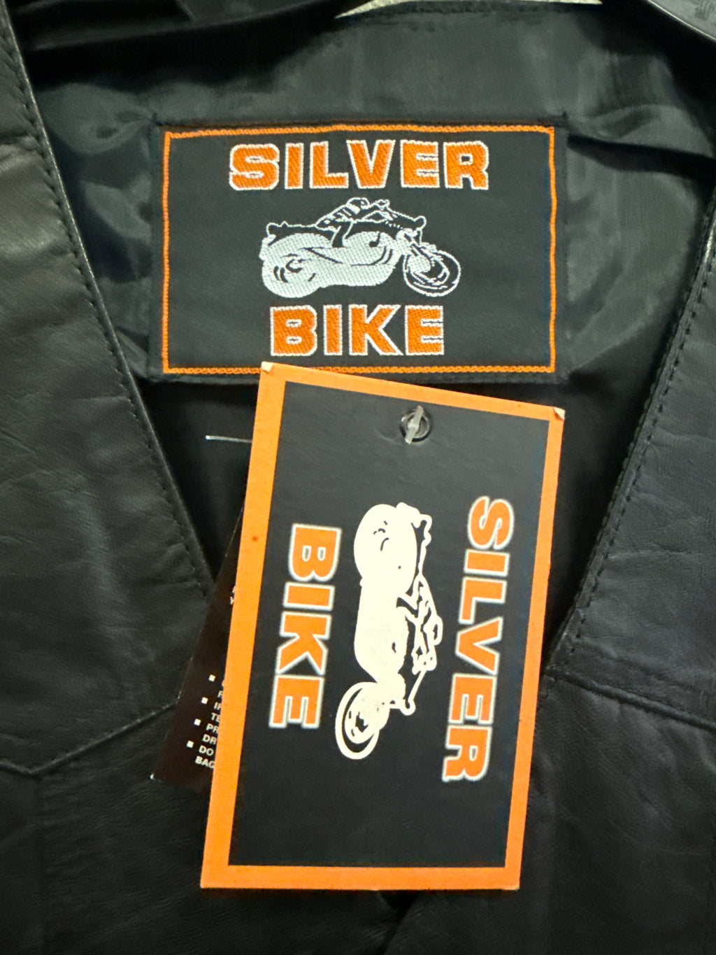 NWT SILVER BIKE RIDING VEST (org$75)