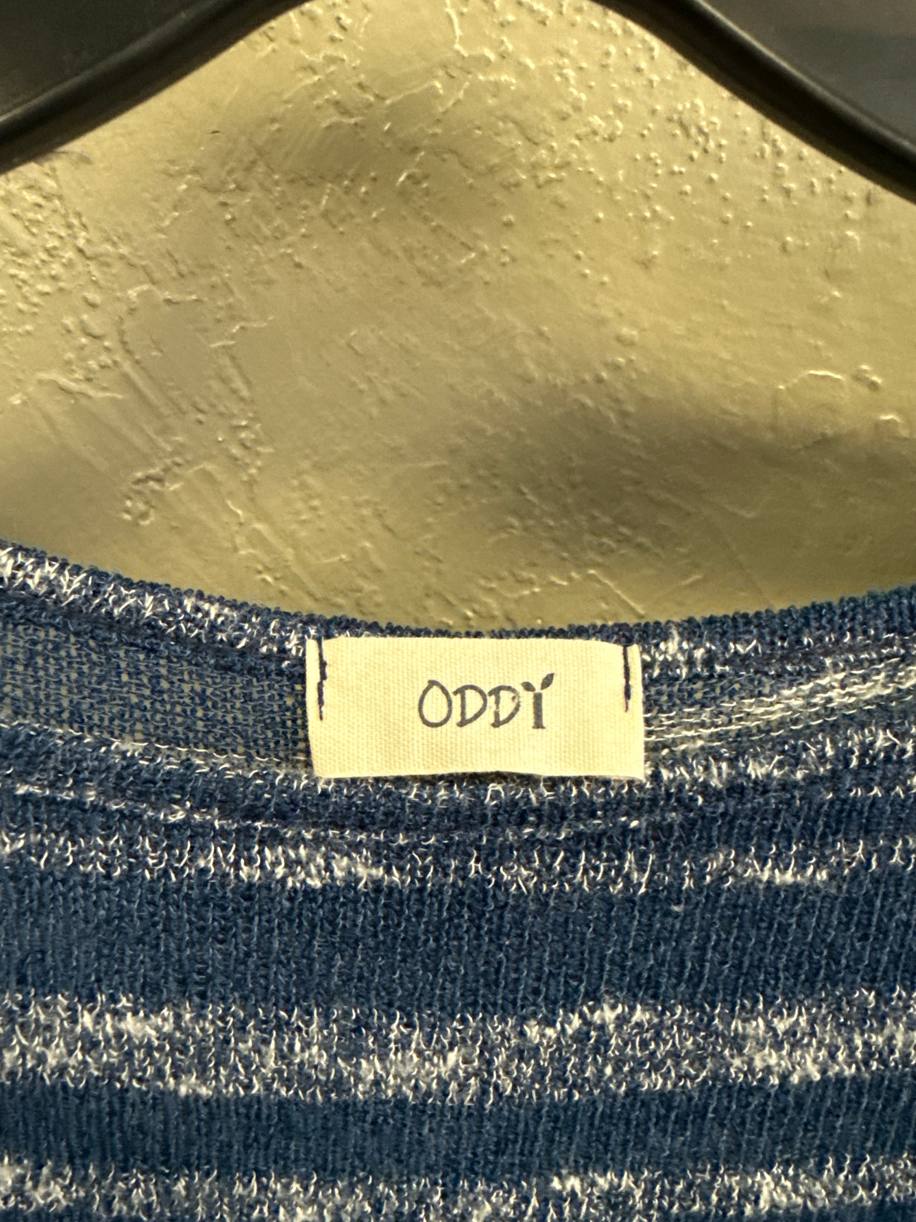 ODDY KNIT SLEEVELESS TOP