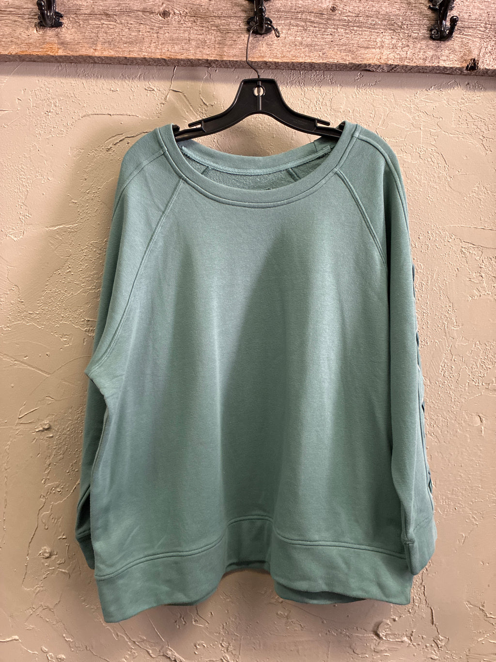 NWOT Meta Crisscross Sleeve Pullover