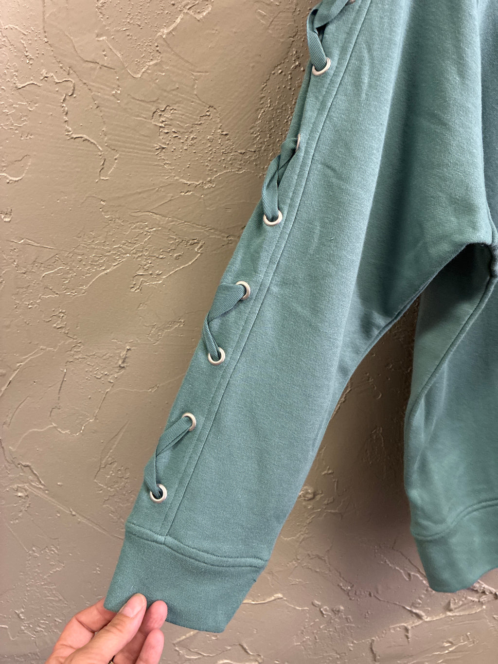 NWOT Meta Crisscross Sleeve Pullover